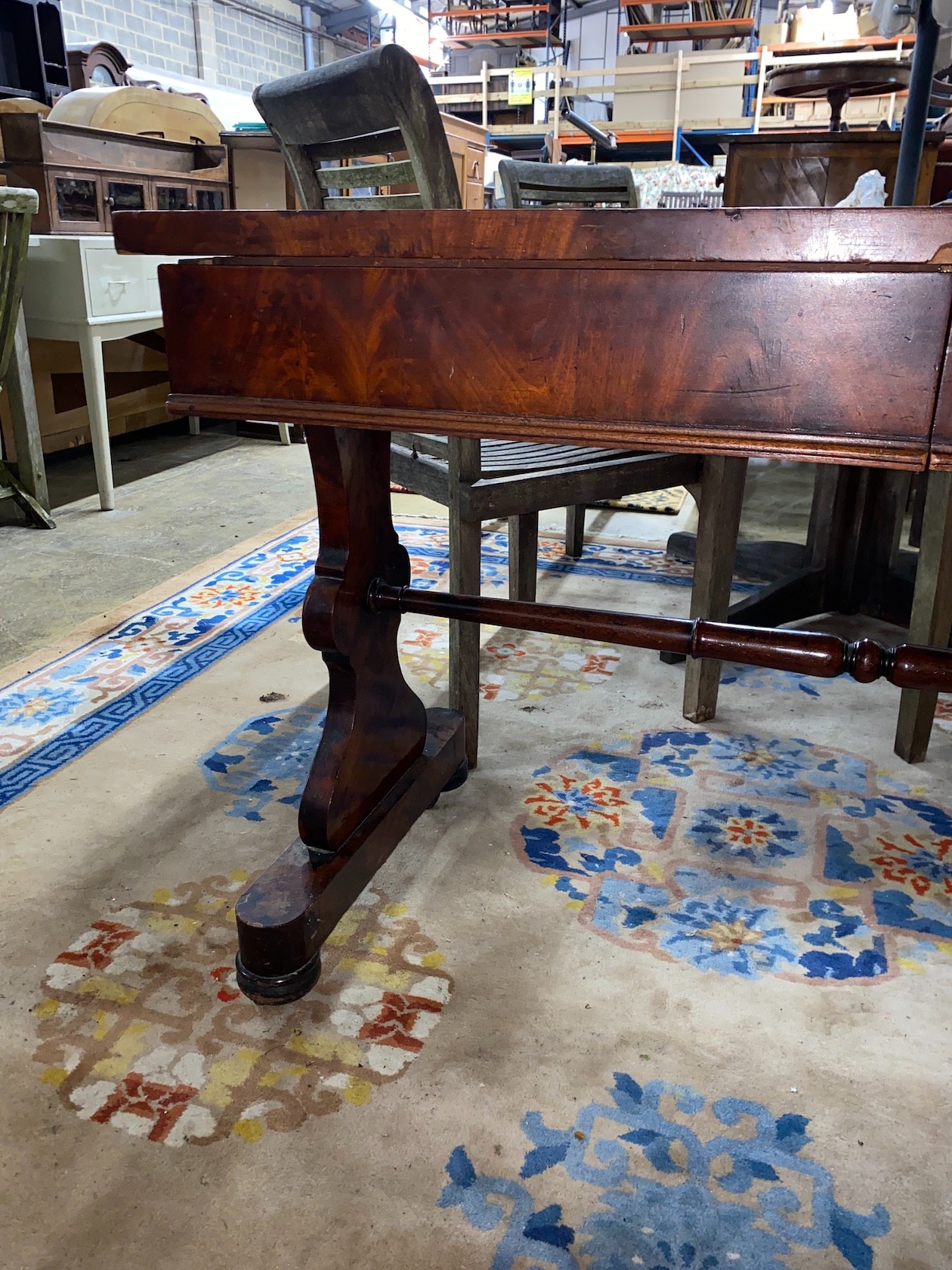 A Victorian mahogany two drawer stretcher table, width 115cm, depth 53cm, height 77cm